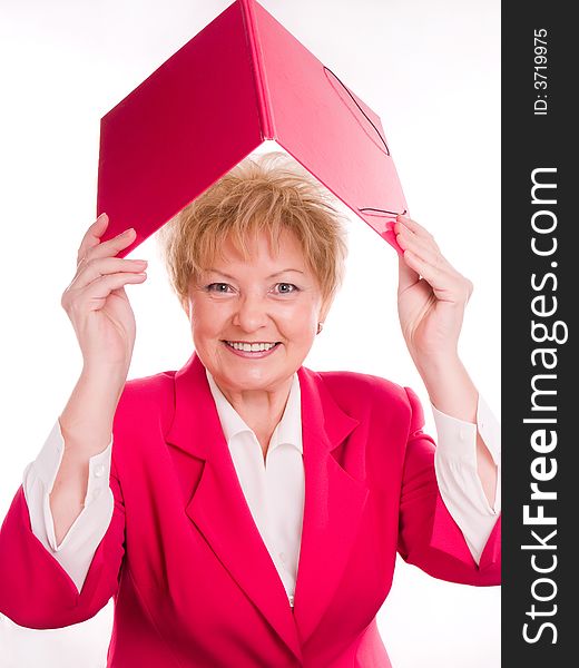 Smiling mature woman with pink folder. Smiling mature woman with pink folder