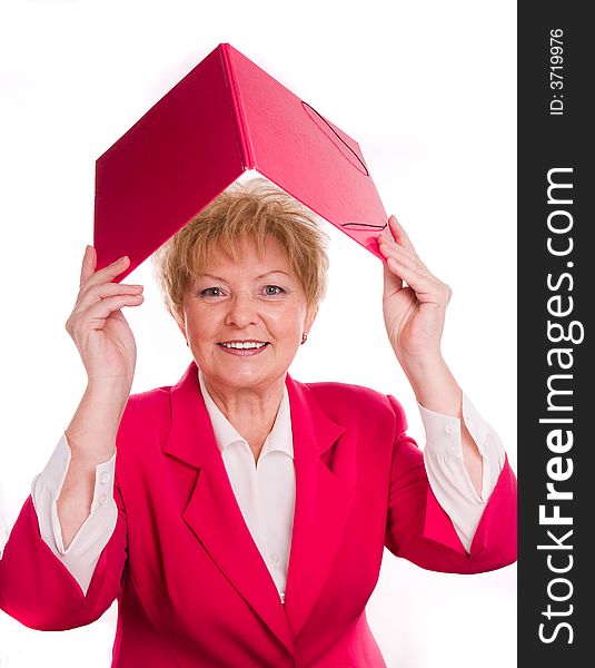 Smiling mature woman with pink folder. Smiling mature woman with pink folder