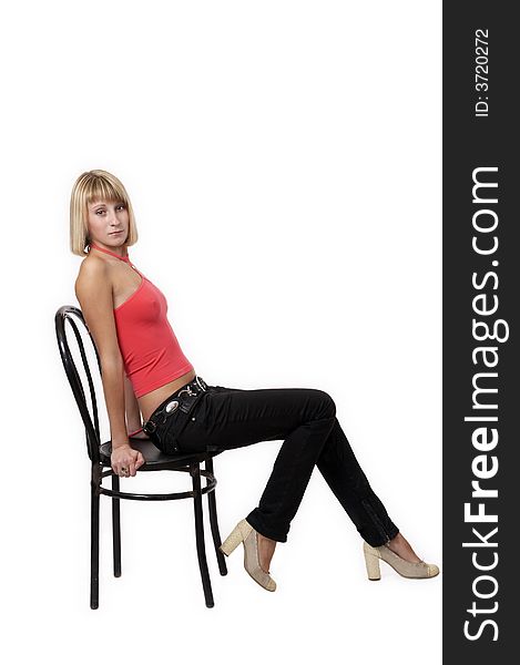 Young Woman Sitting On A Chair