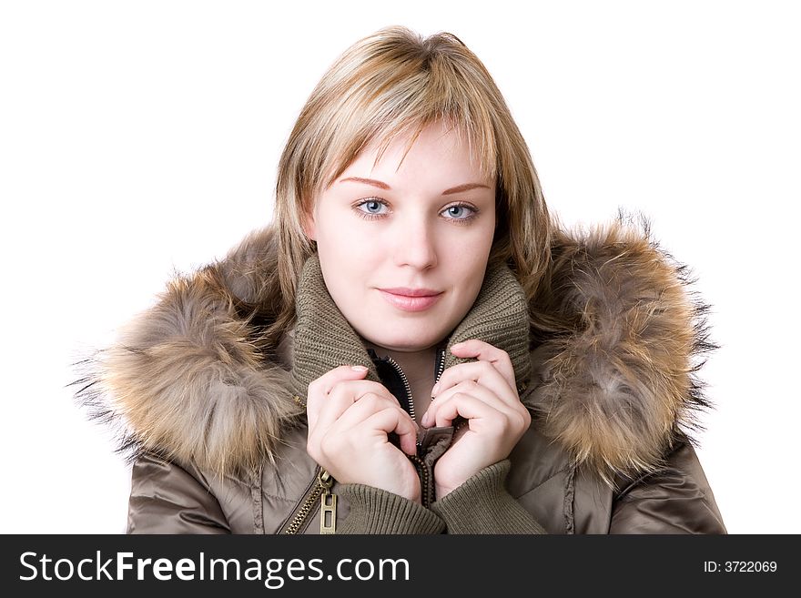 Young girl in a jacket with a fur collar