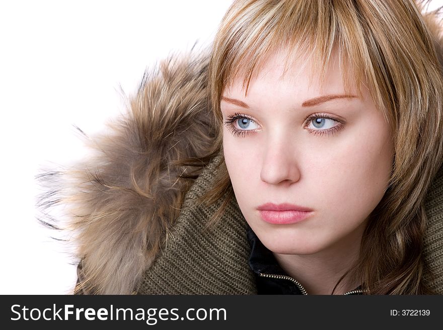 Young girl in a jacket with a fur collar. Young girl in a jacket with a fur collar