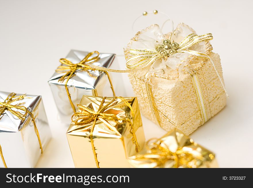 Small boxes with gifts, and the one is special, low DOF, copy space on left top. Small boxes with gifts, and the one is special, low DOF, copy space on left top