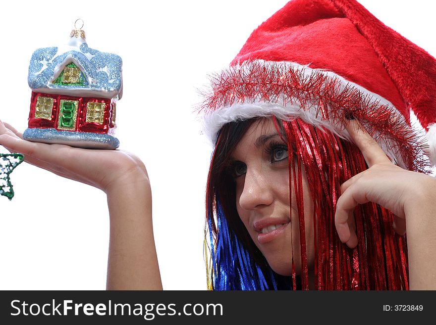 Christmas girl with new home, isolated on white