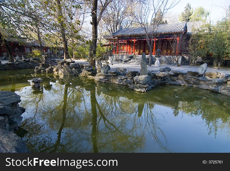 An ancient Chinese garden with pond in Beijing. An ancient Chinese garden with pond in Beijing