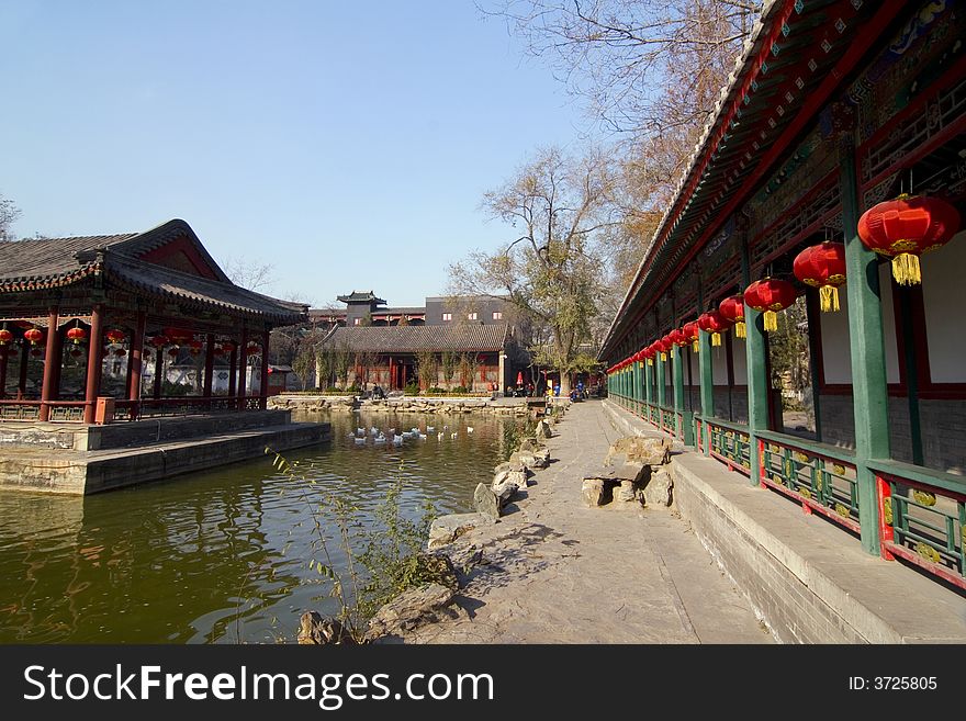 An ancient Chinese garden with pond in Beijing