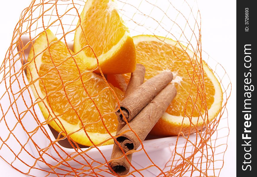 Juicy oranges and cinnamon and ribbon