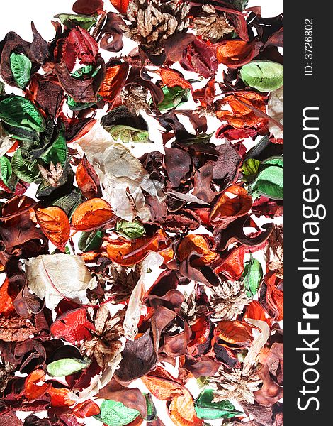 Frame filling shot of pot pourri leaves on backlit background,  great and colorful background