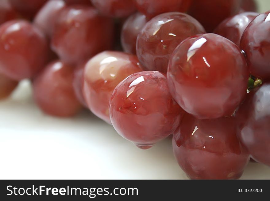 A bunch of red grapes.