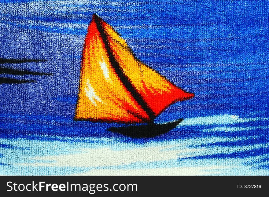 Little boat with a sail. Fragment of picture represented on the surface of fabric. Little boat with a sail. Fragment of picture represented on the surface of fabric.
