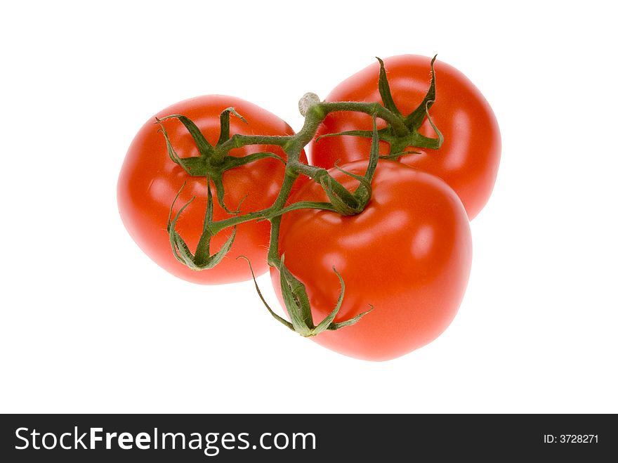 Fresh bunch of tomatos isolated on a white background