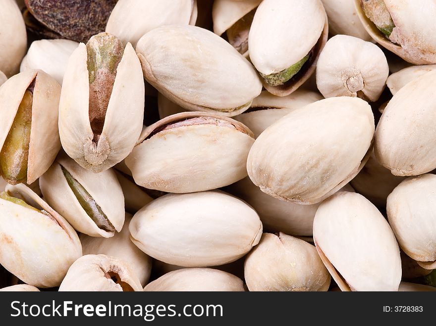 Close-up of fresh pistachio nuts for backgrounds