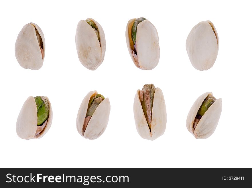 Fresh pistachio nuts isolated on a white background