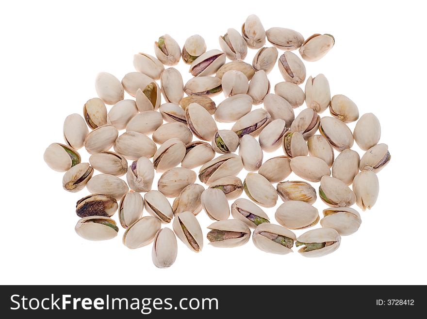 Fresh pistachio nuts isolated on a white background