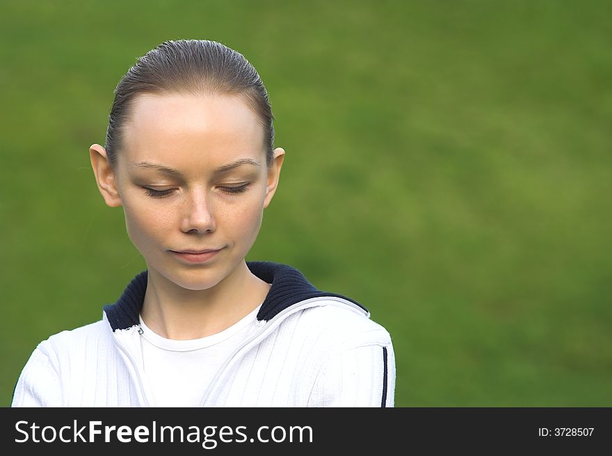 The woman with closed eyes.