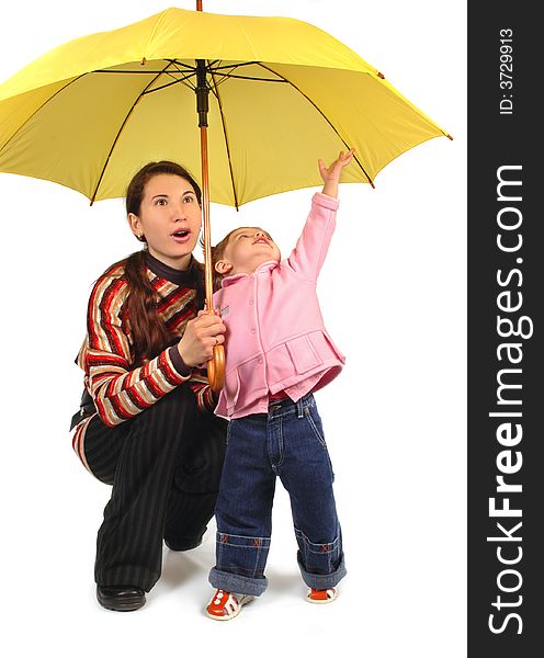 Daughter and mother with yellow umbrella