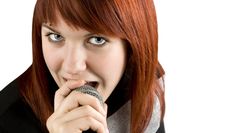 Girl Singing Karaoke On Microphone Royalty Free Stock Photography Girl Singing Karaoke On Microphone Royalty Free Stock Photography