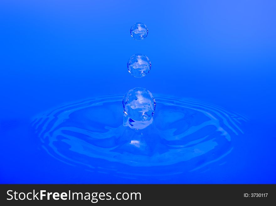 Water drops, on blue background