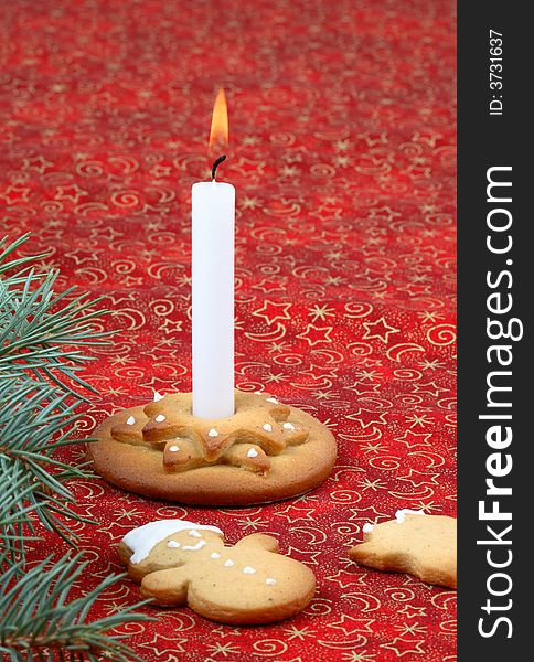 Christmas candlestick, candle and gingerbread