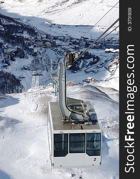 Cervinia mountain resort cable car (Italy); winter season; vertical orientation