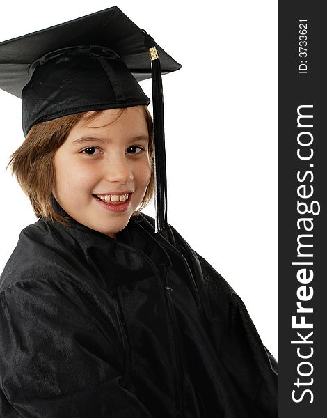 Head and shoulders portrait of a primary student in her graduation cap and gown. Head and shoulders portrait of a primary student in her graduation cap and gown.