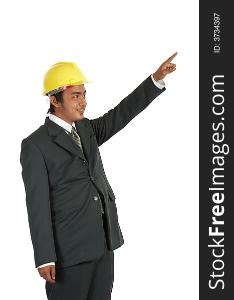 Man wearing a yellow hardhat over a white background. Man wearing a yellow hardhat over a white background