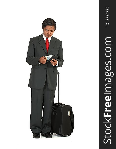 A man with his luggage over a white background. A man with his luggage over a white background