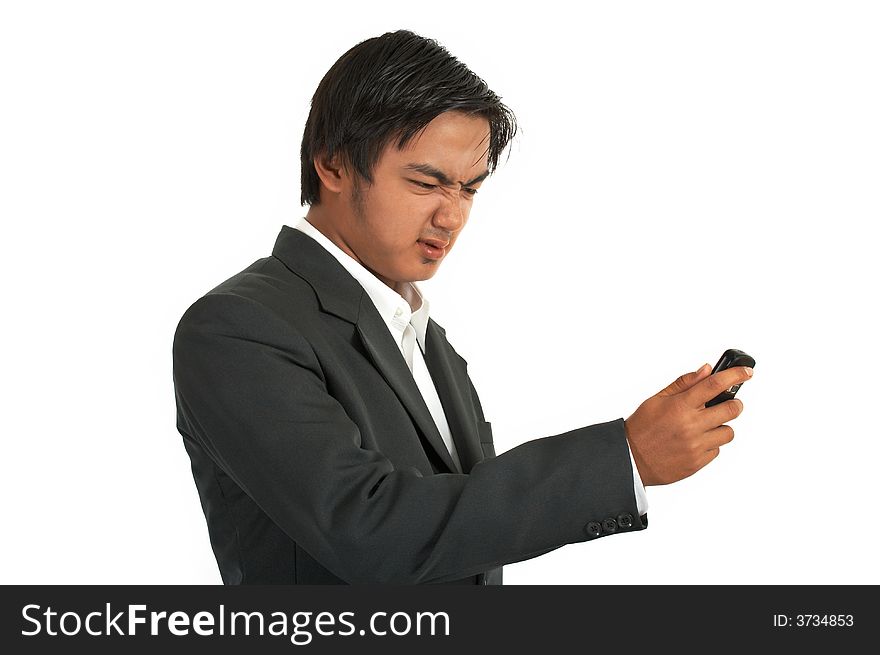 Man sending a text message on a cellphone
