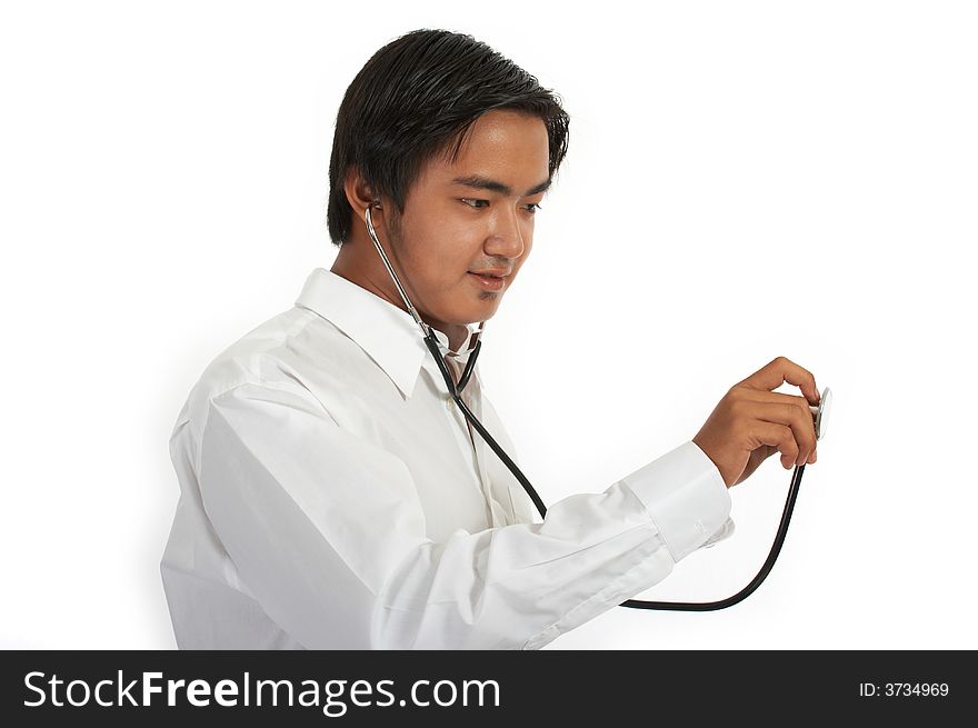A doctor holding a stethoscope over a white background. A doctor holding a stethoscope over a white background