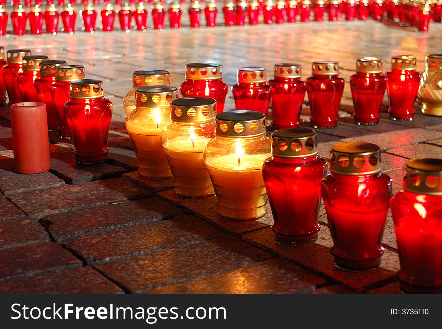 Lighting candles on the square