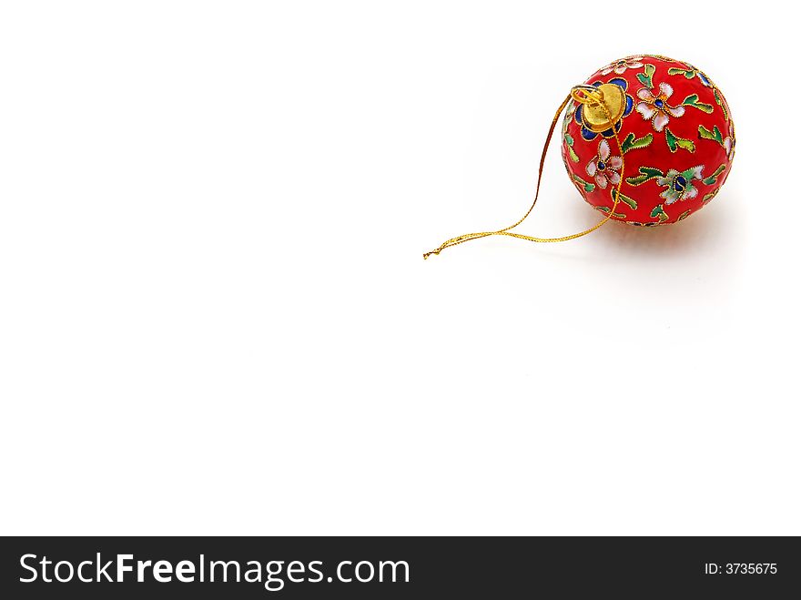 Christmas Time: Isolated floral bauble lying down, with plenty of copy space. Christmas Time: Isolated floral bauble lying down, with plenty of copy space