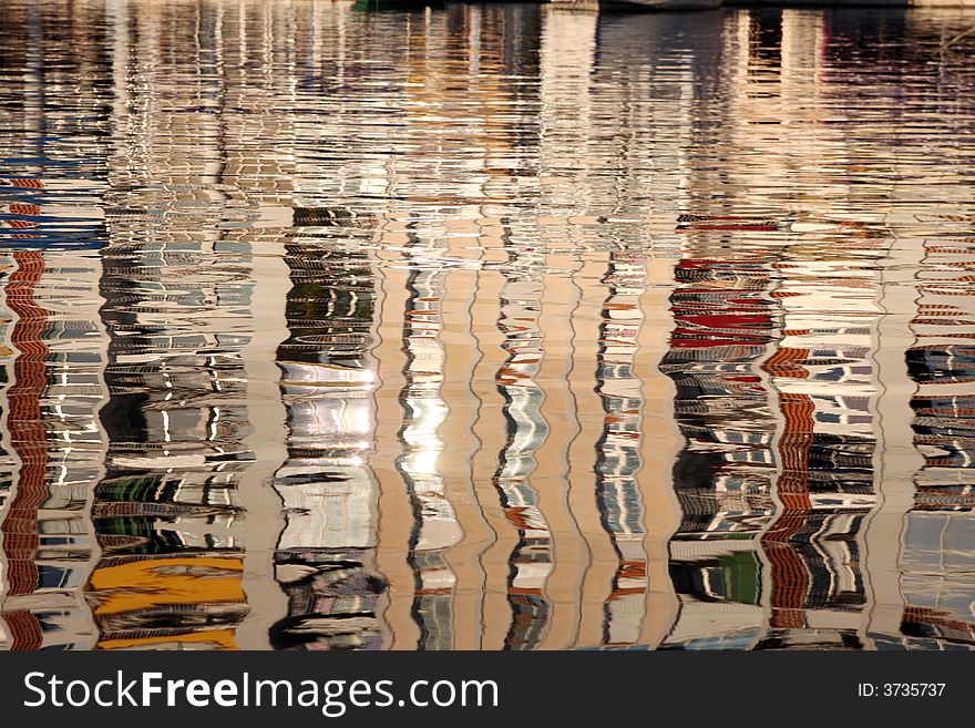 Building reflections in toulon harbour