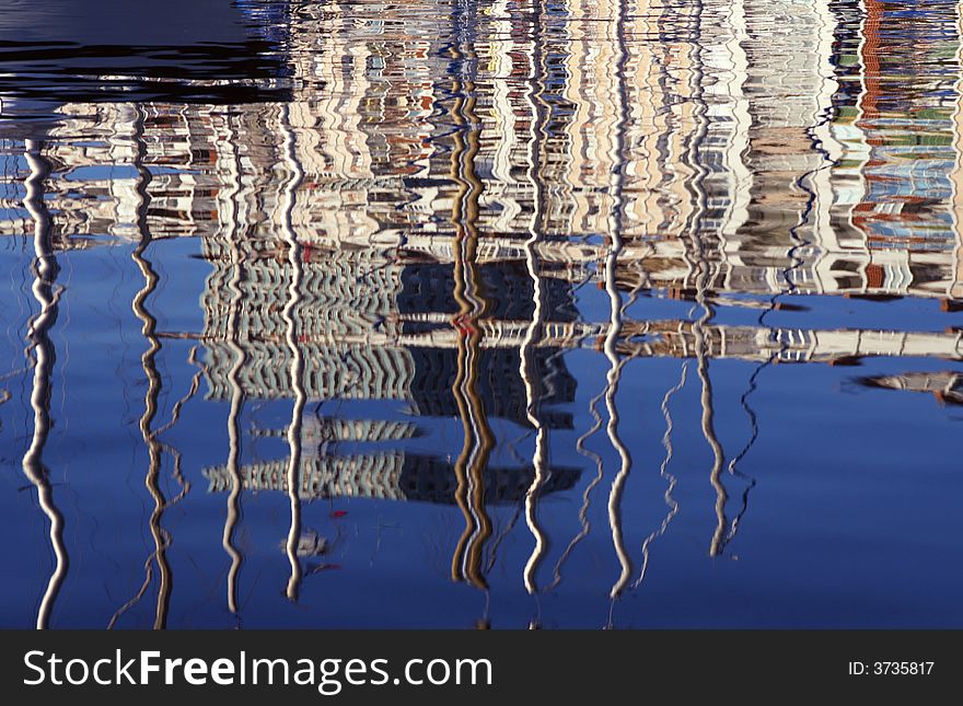 Building reflections in toulon harbour