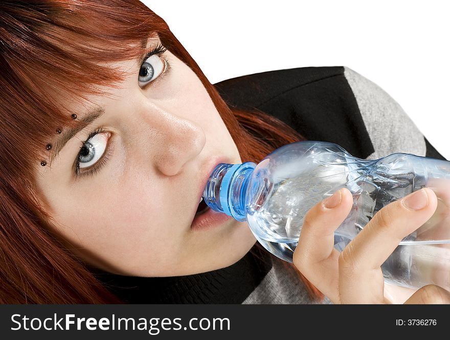 Seductive redhead girl looking at camera and drinking a bottle of water.

Studio shot. Seductive redhead girl looking at camera and drinking a bottle of water.

Studio shot.