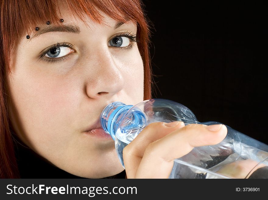 Redhead drinking water