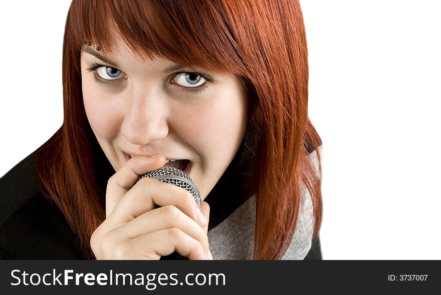 Girl singing karaoke on microphone