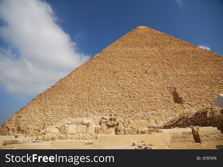 The Pyramid of Giza built for Pharaoh Cheops in the 4th dynasty about 2690 B.C. It is made from limestone from the Mokattam Mountains near Cairo. Its height is 140 m and its lateral length 230 m.