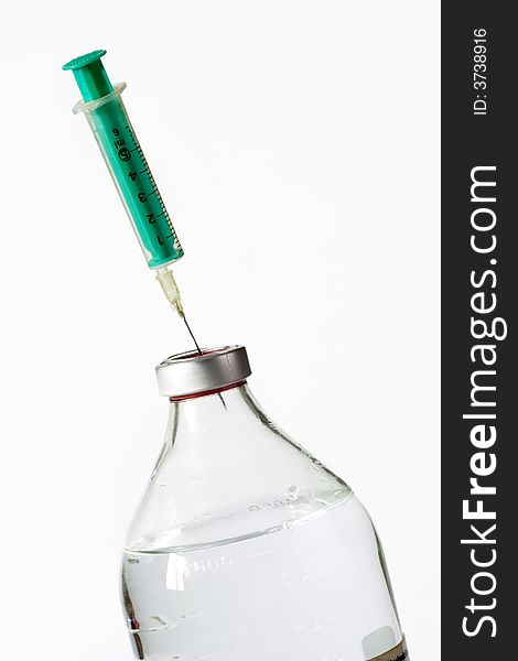 Bottle Isotonic solution with a Syringe