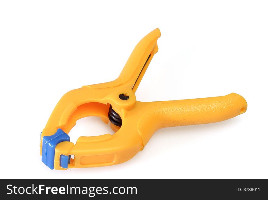 Orange spring clamp on white background