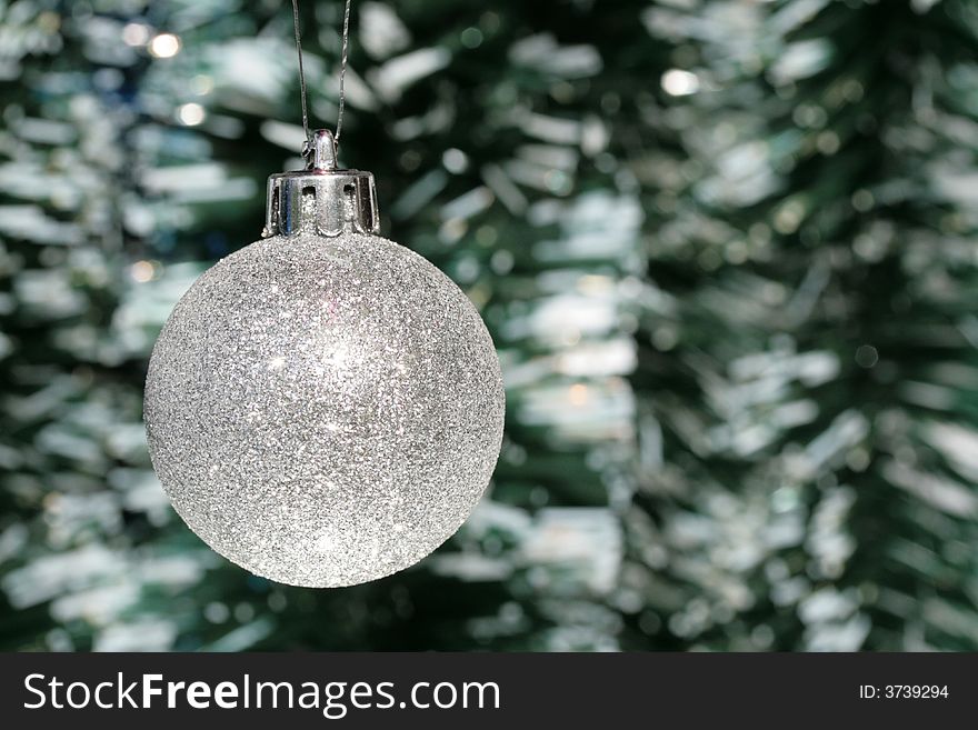 Christmas decoration - silver ball and tinsel