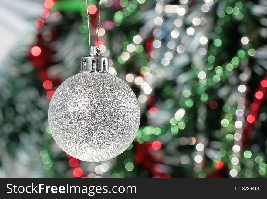 Christmas decoration - silver ball and color tinsel