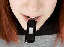 Girl Biting A Flash Drive Royalty Free Stock Image Girl Biting A Flash Drive Royalty Free Stock Image