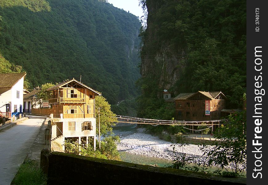 This is a old-style house in the countryside, among mountains, the photo take the morning's scene, very nice!. This is a old-style house in the countryside, among mountains, the photo take the morning's scene, very nice!