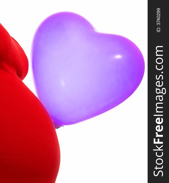 A lady in red with heart shape balloon