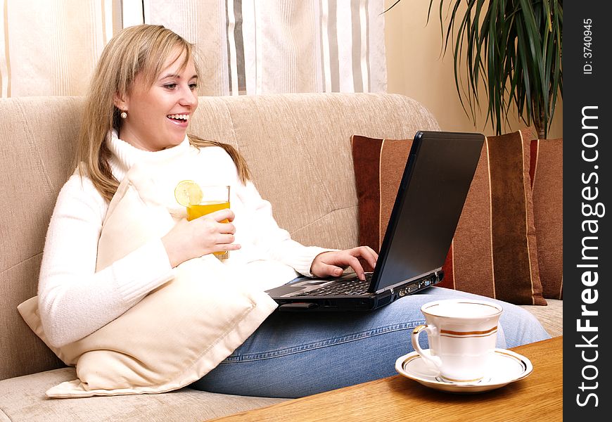 Beautiful Woman Working On Her Laptop.