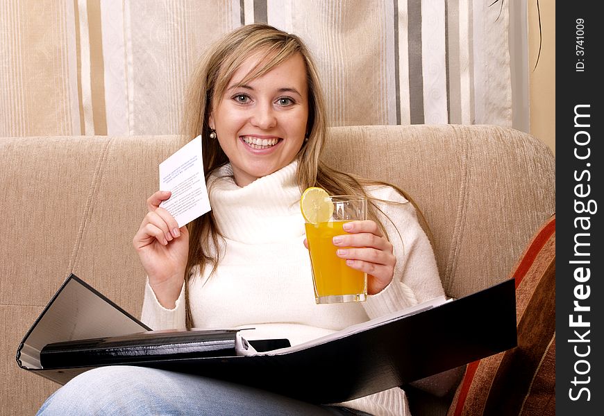 I found it! Happy female student with important card.