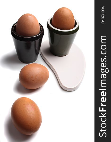 Design and eggs on the white background