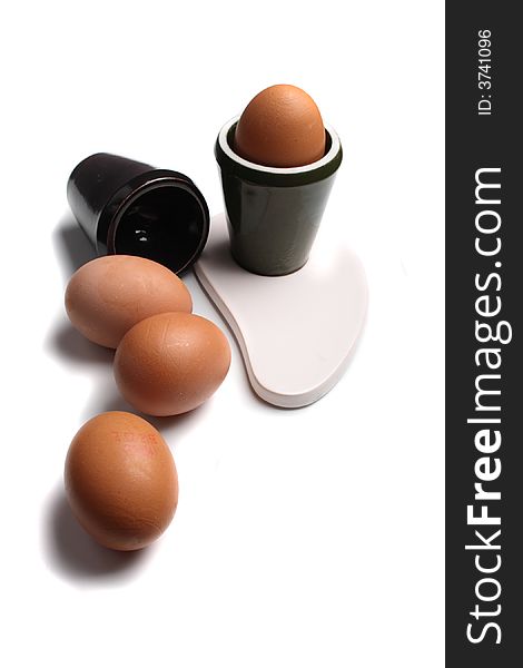 Design and eggs on the white background