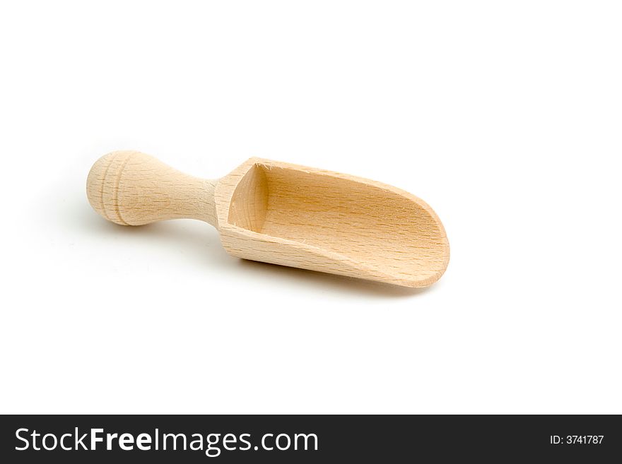 An empty wooden spoon isolated on white