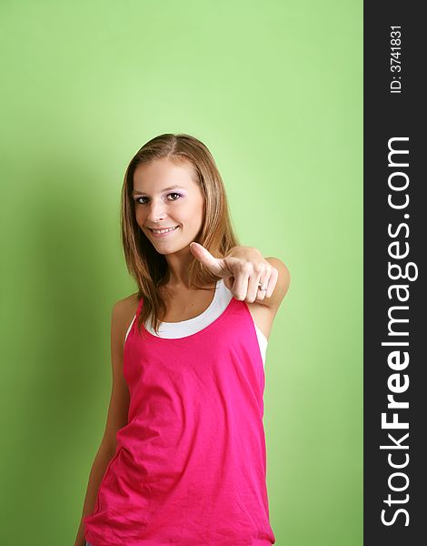 Beauty portrait of a happy young smiling woman with thumb up. Beauty portrait of a happy young smiling woman with thumb up