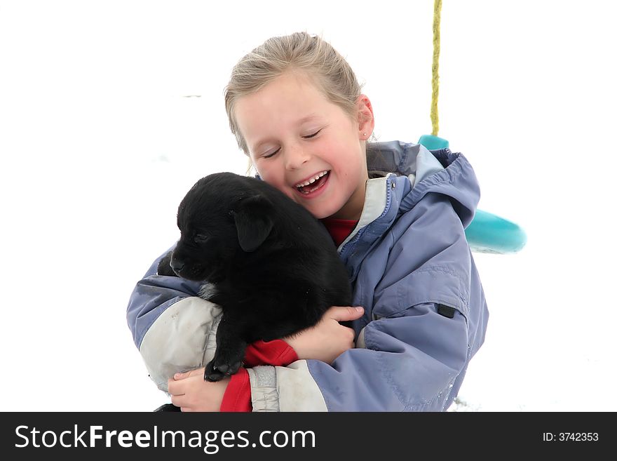 Little girl playing with her puppy. Little girl playing with her puppy